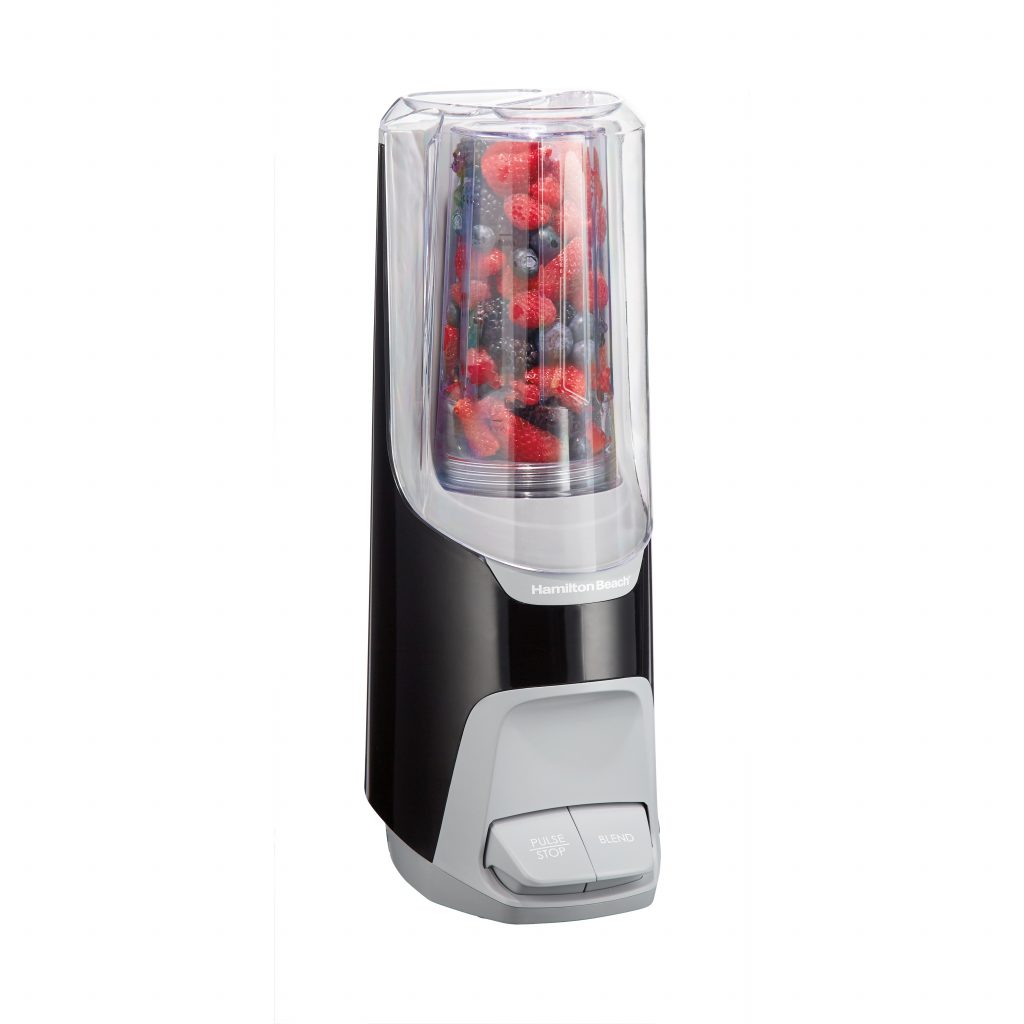 Black and gray personal blender with jar filled with fruit