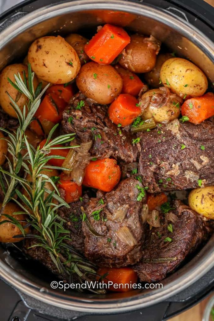 Pot Roast with meat, new potatoes, carrots and rosemary
