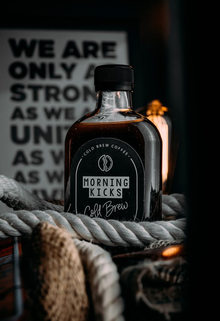 Bottle of Morning Kicks Cold Brew Coffee surrounded by rope